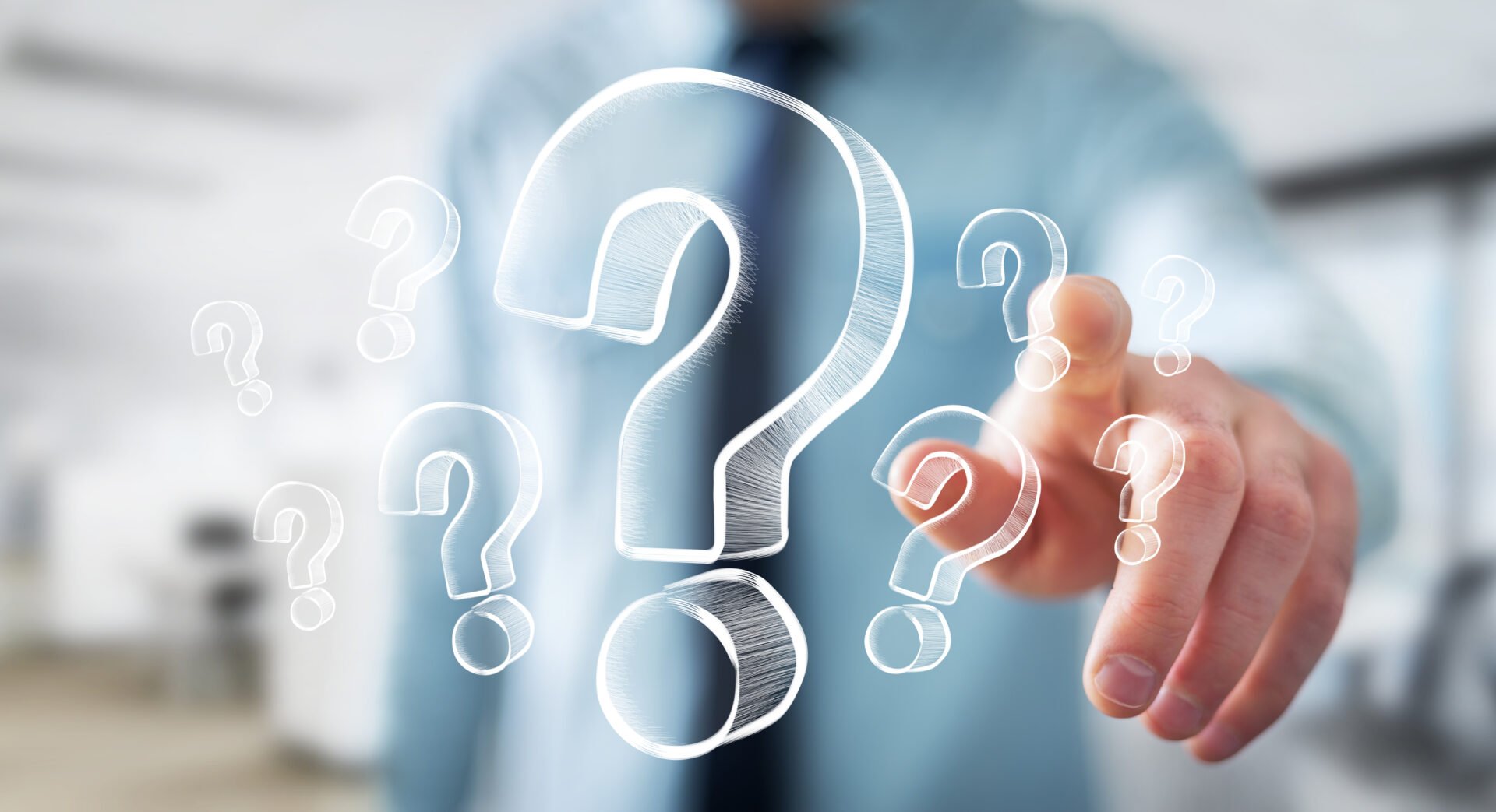 In der Luft schwebende Fragezeichen